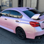 light pink matte car wrap on Subaru