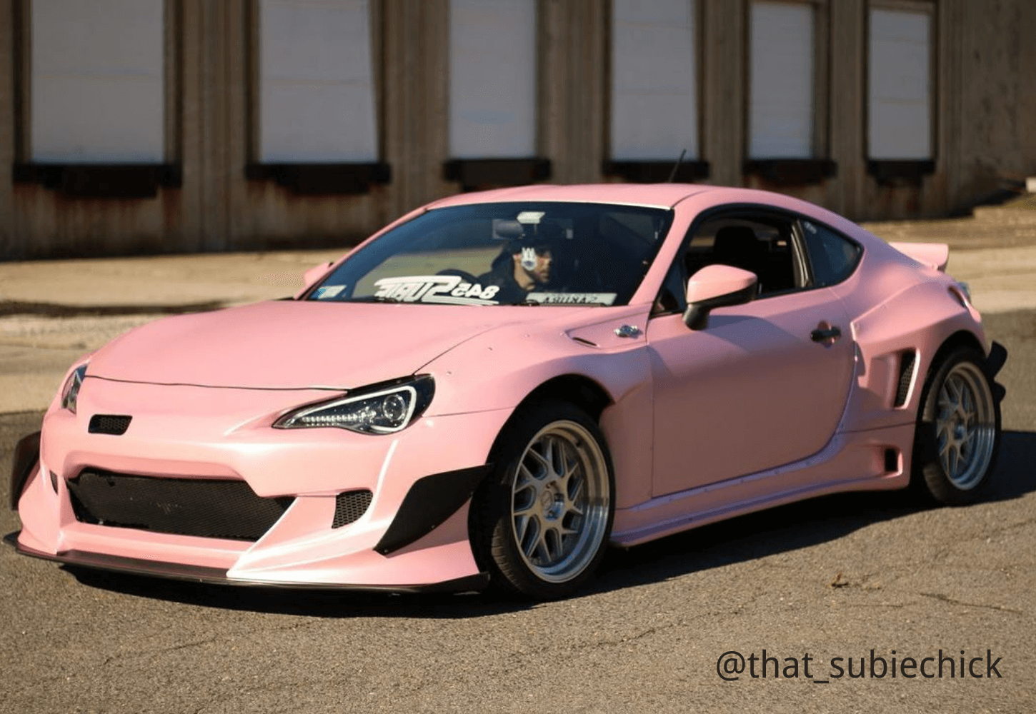 a car that wrapping carlawrap's light pink matte metallic vinyl wrap